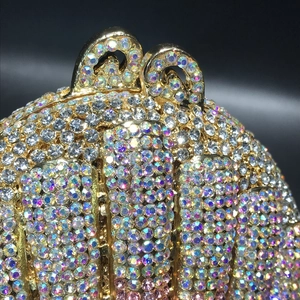 Detail shot of the luxury shell-shaped evening clutch with iridescent crystal rhinestones