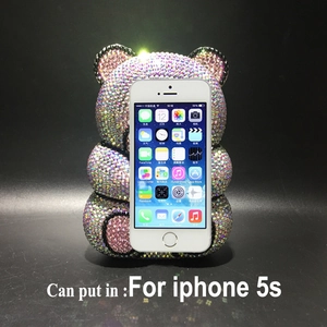 Detailed comparison of bear crystal evening bag size against an iPhone 5s mobile phone
