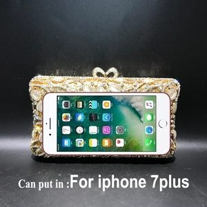 Detailed view showing luxury crystal evening bag capacity fitting an iPhone 7 Plus