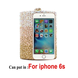 Detailed interior capacity showing space for an iPhone 6s inside the crystal clutch bag