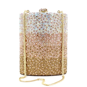 Macro detail of gradient rhinestones on wine-flask shaped luxury evening clutch bag