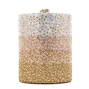 Elegant gold gradient crystal clutch bag with rhinestone inlay and jeweled clasp