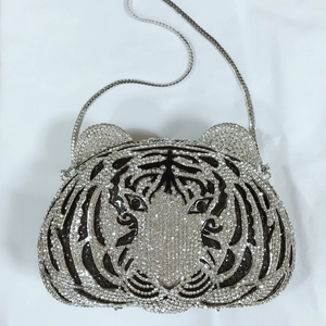 Elegant tiger head evening bag with sparkling crystals and silver metal chain strap