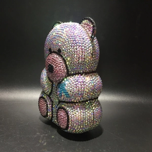 Detailed view of bear-shaped clutch bag with sparkling colorful AB rhinestones and crystals