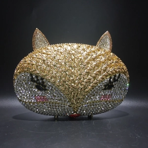 Luxury fox-shaped evening clutch bag encrusted with gold and silver crystals and rhinestones