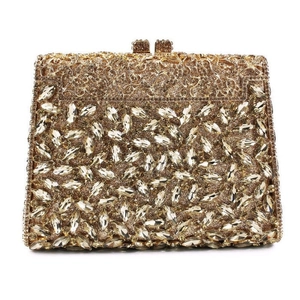 Golden evening clutch bag with luxury hollow metal carving and sparkling crystal rhinestones