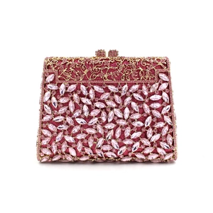 Luxury pink rhinestone clutch bag with gold filigree metal frame and crystal clasp