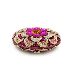 Exquisite close-up of floral rhinestone evening clutch bag with pink gemstone detail