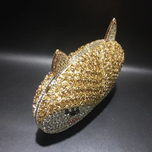 Detail of fox-shaped evening bag featuring champagne and silver crystal rhinestones