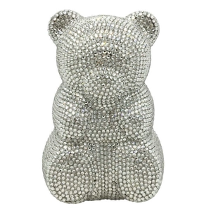 Detailed view of hand-set crystal rhinestones on a bear-shaped evening clutch bag