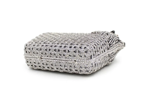 Macro shot of silver crystal clutch featuring intricate leopard head and geometric rhinestones