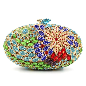Pochette de soirée ovale de luxe avec strass floraux colorés sur cadre en métal