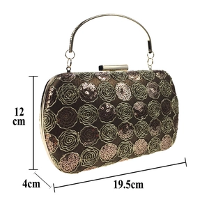 Detail view of gold sequin rose embroidery clutch bag showing 19.5x12x4cm dimensions