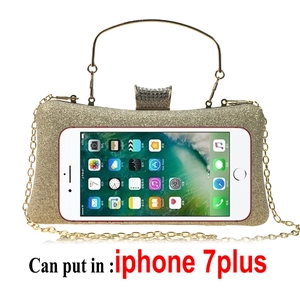 Golden sequined evening clutch with metal ring handle fitting a 5.5 inch smartphone