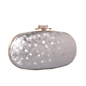 Silver water cube texture evening clutch bag with rose gold frame and diamond bow clasp