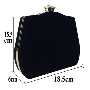 Detail view of black velvet evening bag with crystal clasp and dimensions 18.5x15.5x6cm