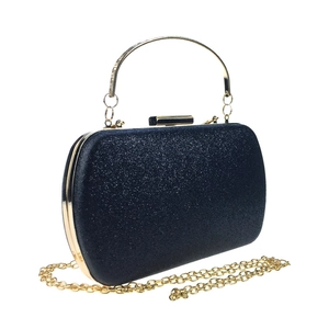 Detail of glitter box clutch bag featuring gold handle and detachable chain strap