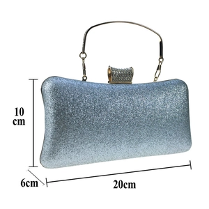 Silver-blue evening clutch bag with sequins, gold handle, and dimensions 20x10x6 cm