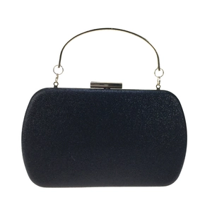 Detail of blue glitter party clutch bag with gold round handle and metal lock