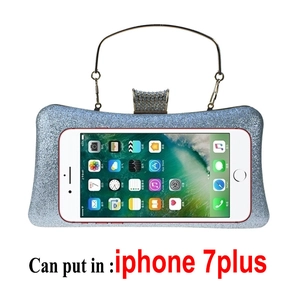 Blue glitter evening clutch showing capacity for an iPhone 7 Plus with metal handle