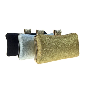 Detailed trio of sequined evening clutch bags in gold silver and black with diamond clasps