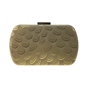 Detail of champagne gold evening clutch with metallic fish scale pattern and metal clasp