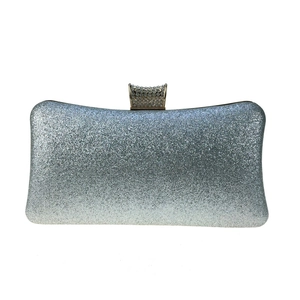 Luxury silver sequined evening clutch bag with sparkling diamond-encrusted top clasp