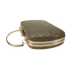 Detail of champagne gold evening clutch with crescent print fabric and ring handle