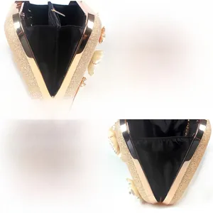 Champagne gold evening bag detail showing satin lining, zipper pocket, and phone storage