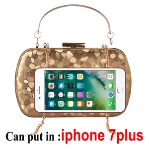 Golden clutch bag with stone-textured finish and metal handle showing phone capacity