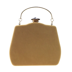 Detail of velvet gourd clutch with gold circular handle and crystal rhinestone clasp