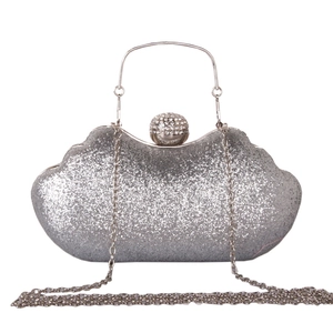 Elegant silver glitter evening clutch bag with wave shape and crystal-encrusted sphere lock
