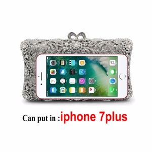 Silver hollow out crystal evening clutch bag with heart clasp and rhinestone finish