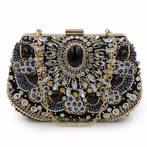 Vintage black beaded evening clutch bag with ornate crystals and gold chain strap
