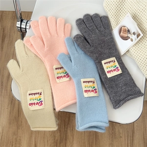 Colorful knitted winter gloves for men and women with stylish woven letter tags