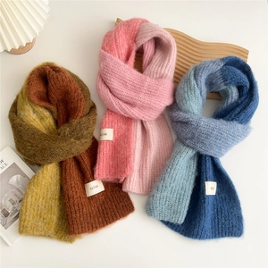 Three-color knitted scarves in burgundy and earth tones with warm mohair-like texture
