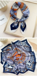 Detail of printed silk square scarf with geometric patterns in navy blue and orange