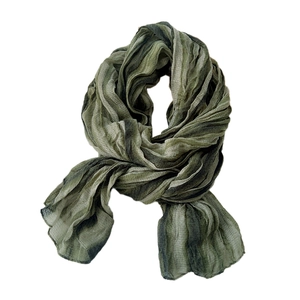 Olive green and dark grey gradient striped scarf with a soft pleated texture and knot