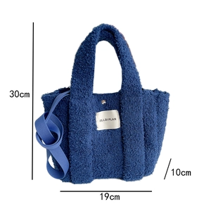 Detailed size view of blue plush tote bag with dimensions 30cm height and 19cm width
