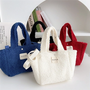 Plush teddy fleece tote bags in four colors with minimalist brand patch for women
