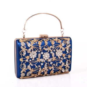 Luxurious navy blue evening clutch with golden filigree and sparkling rhinestones