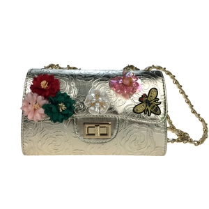 Satin floral trifold clutch with embossed rose pattern and bee embroidery detail