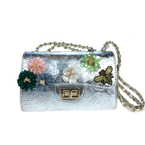 Silver embossed evening bag with 3D satin flowers and embroidered bee on chain strap
