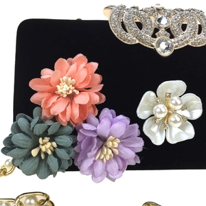 Elegant black velvet evening bag with silk flowers, pearls and rhinestone crown detail