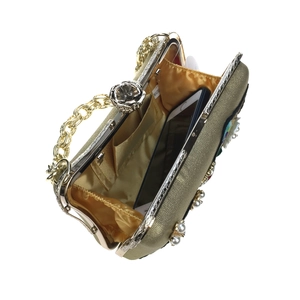 Elegant gold evening clutch with bird embroidery and pearl floral accents in cross-grain leather