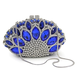 Detail of royal blue marquise crystal evening clutch with hollow metal frame