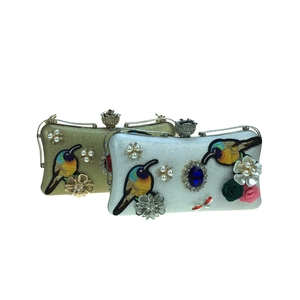 Exquisite floral embroidery evening clutch with bird motifs and sparkling rhinestones