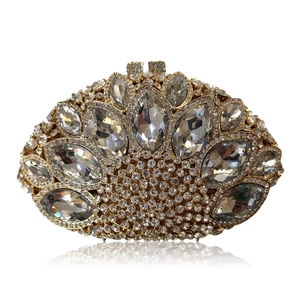 Luxury oval evening clutch with crystal rhinestones and golden metal peacock design