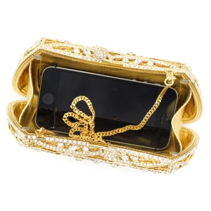 Pochette de soirée dorée évidée avec strass et bandoulière amovible en chaîne métallique