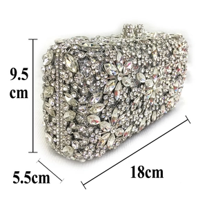 Detailed view of silver rhinestone evening clutch with size 18cm x 9.5cm x 5.5cm